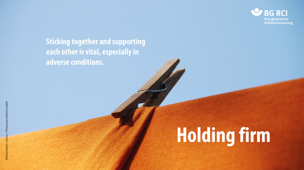 Holding firm. Sticking together and supporting each other is vital, especially in adverse conditions.
