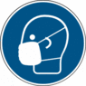 Rundes Piktogramm zeigt Kopf mit Mund-Nase-Schutz in Maskenform